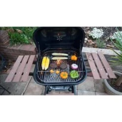 Americana 25" Black Swinger Charcoal Grill With An Adjustable Six-Position Cooking Grid -Grill Collection Americana 25 Black Swinger Charcoal Grill with an Adjustable Six Position Cooking Grid 4